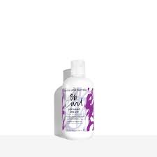Bottle of hair care product with purple label on a white background. Bumble and Bumble Curl Defining Cream 8.5oz jar, styling cream that defines, hydrates, and controls curls while reducing frizz and enhancing shine and bounc