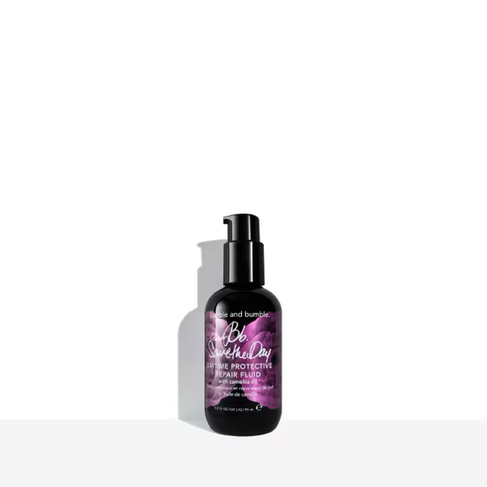 Bottle of Bumble and Bumble hair product on a white background. Bumble and Bumble Save the Day Daytime Protective Repair Fluid 3.2oz bottle, lightweight treatment that protects, repairs, and strengthens hair during the day.