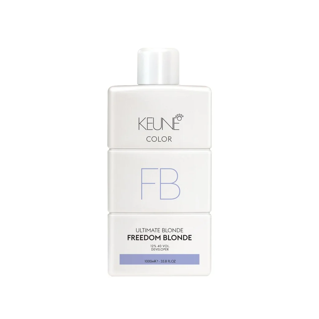 Keune Color Ultimate Blonde Freedom Blonde 9% 30 Vol Developer 33.8oz bottle, professional hair developer that activates color for vibrant, long-lasting blonde results.