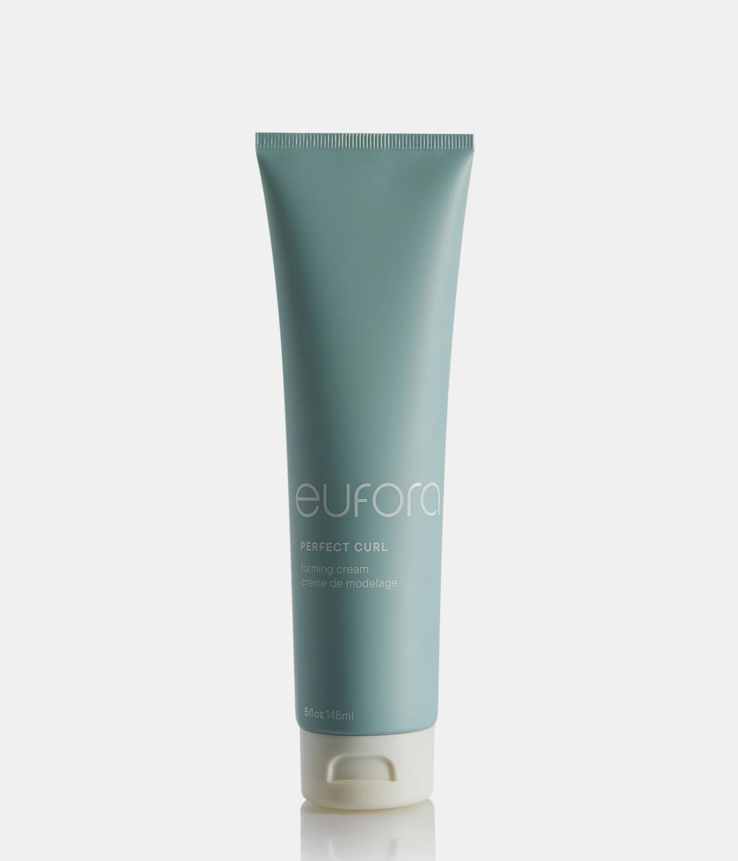 Blue tube of Eufora Perfect Curl product on a white background