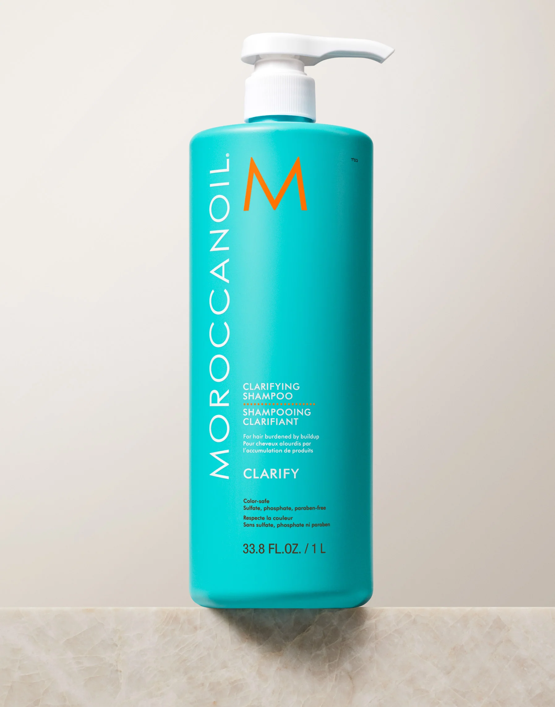 Moroccanoil shampoo bottle on a light background