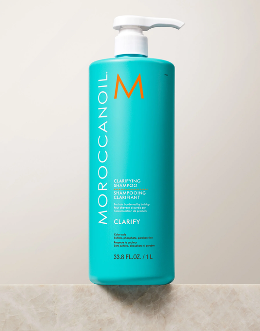 Moroccanoil shampoo bottle on a light background