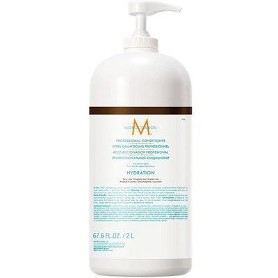 Large white bottle of Moroccanoil conditioner on a white background