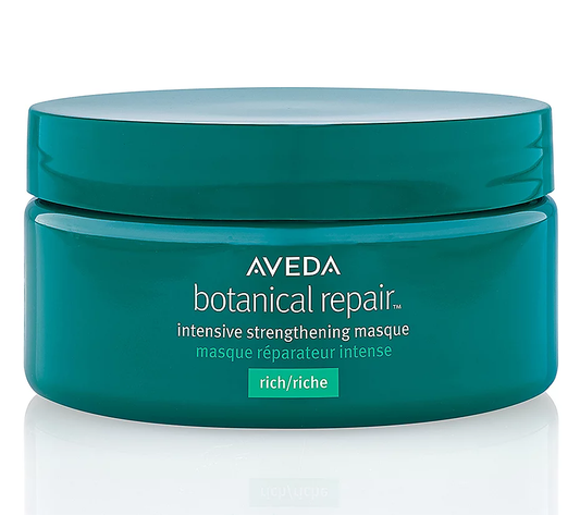 Aveda botanical repair intensive strengthening masque jar on a white background.Aveda Botanical Repair Intensive Strengthening Masque Rich 6.8oz jar, deeply nourishing treatment that repairs, strengthens, and restores damaged hair.