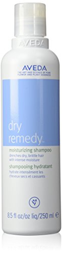 Aveda dry remedy moisturizing shampoo bottle on a white background. Aveda Dry Remedy Moisturizing Shampoo 8.5oz bottle, gentle shampoo that deeply hydrates and nourishes dry hair while leaving it soft, smooth, and healthy.