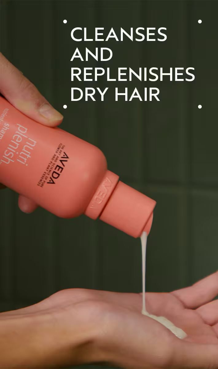 Aveda hair care product being applied to a hand with text 'Cleanses and replenishes dry hair' on a green background. Aveda Nutriplenish Light Moisture Shampoo 8.5oz bottle, lightweight shampoo that gently hydrates, nourishes hair, and enhances softness and shine without weighing it down.