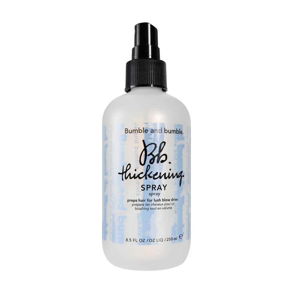 Bumble and bumble thickening spray bottle on a white background. Bumble and Bumble Thickening Blow-Dry Prep Spray 8.5oz bottle, lightweight prep spray that adds volume, boosts body, and provides heat protection for fuller-looking hair.