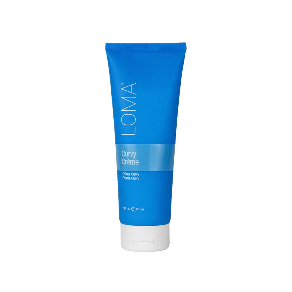 Blue tube of LOMA Curvy Creme on a white background. Loma Curvy Créme 8oz jar, styling cream that defines curls and waves, adds bounce and shine, controls frizz, and leaves hair soft and manageable.