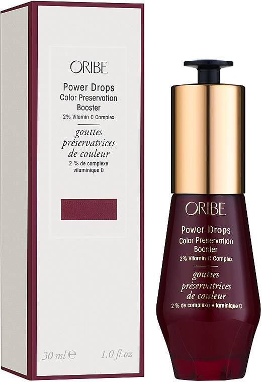 Oribe Power Drops Color Preservation Booster with packaging on a white background.Oribe Color Power Drops Color Preservation Booster 1oz, 2% Vitamin C Complex that protects hair color, boosts vibrancy, and prolongs color-treated hair’s lifespan.